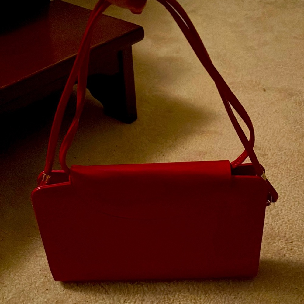 Red leather shoulder purse. Leather. Purchased in 1997. Great condition.